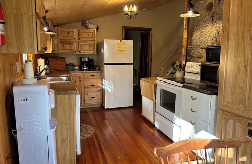 Lucerne-in-Maine Cabin | Spacious 2-bedroom log cabin in tranquil Dedham, Maine with AC.