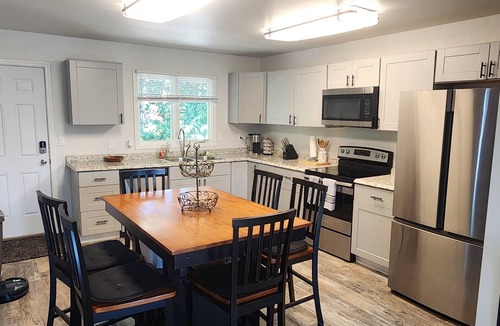 Sand Lake Condo | Spacious 3-bedroom Duplex, sleeps 6, heated garage and close to shopping.