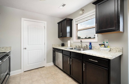Oak Grove House | Spacious Haven near Fort Campbell with Bonus Room and Fenced Yard