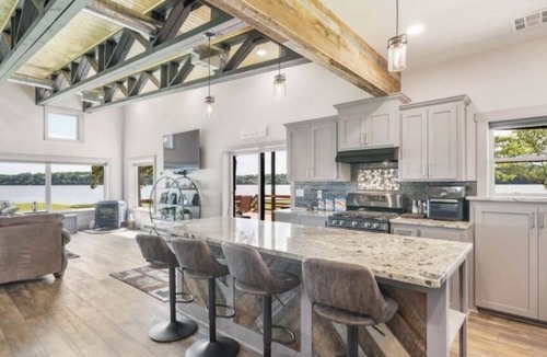 Wyandotte House | Spacious Lakefront Home w/hot tub, dock, & private ramp