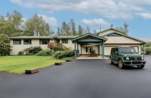 Sand Lake House | Spacious Lakeside Home with Firepit, Wraparound Deck, Kayaks & Gym