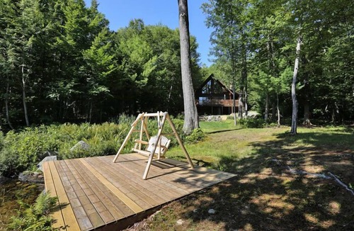 South Casco Cottage | Spacious log cabin with 600' of water frontage on picturesque Moose Pond.