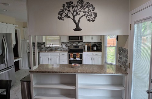 Kansas City House | Spacious Retreat 4BR 3BA Patio & Den in Marvelous KC