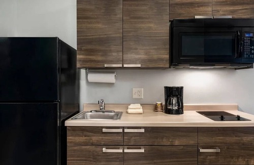 Rogers Hotel | Spacious Room w/Kitchen, Pet-Friendly & Free Parking for Extended & Short Stays