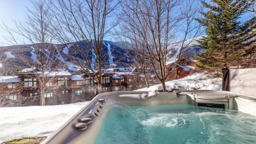 Spruce Peak House | STOWE GLOBE 4 BEDROOM LUXURY CABIN SKI IN SKI OUT By Stowe Mountain Rentals