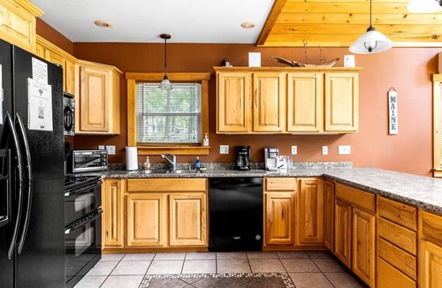 Dover-Foxcroft Cabin | Stunning Cabin Surrounded by Trees and Fire Pit Provided in Bowerbank, Maine