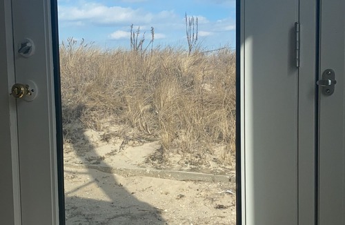 Milford House | Stunning, light-filled beachfront sanctuary with full views of Delaware Bay.