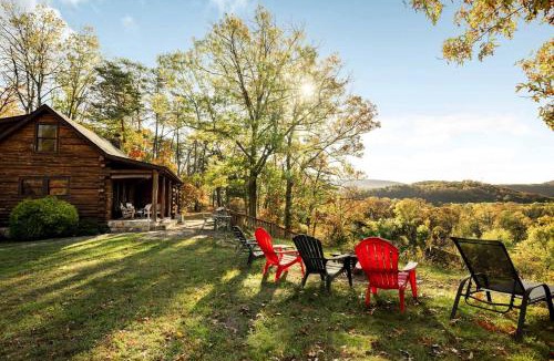 Paw Paw House | Stunning Secluded Log Cabin with River Access in Paw Paw, Maryland