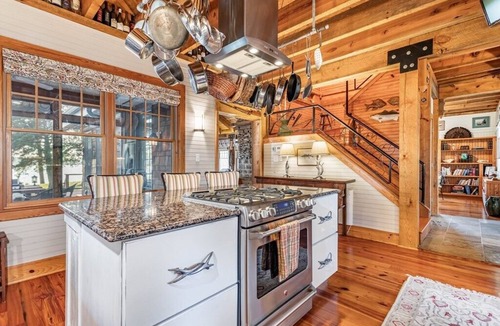 Belle Haven House | Stunning waterfront masterpiece, constructed custom oasis!