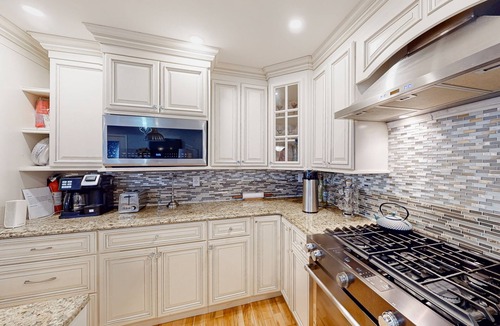 Westbrook Condo | Stylish condo with a high-end kitchen, washer/dryer, & large yard