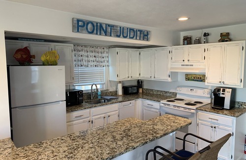 Breakwater Village Cottage | Summer, Winter rental with private beach