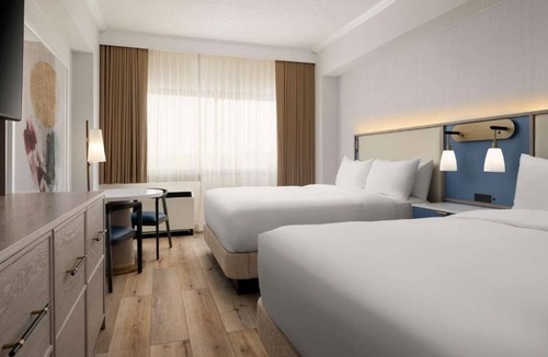 White Plains Hotel | Superior 2BR Comfy Retreat | Bar, Gym, Shuttle & Pets Welcome