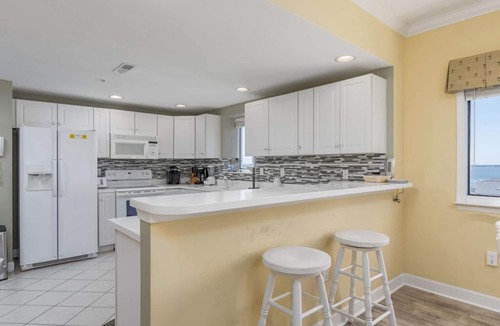 Midtown Ocean City Condo | Tastefully decorated 3 bedroom ocean block condo with outdoor pool. Convenient to the beach, shops and restaurants.