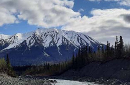 McCarthy RV Rental | Tents at the headwaters of the Kennicott River in marvelous McCarthy with WiFi