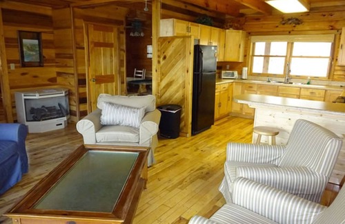 True Cabin | The West Virginian 3 storey log cabin in 10 acre wooded area adjacent to Pipestem State Park and Resort.