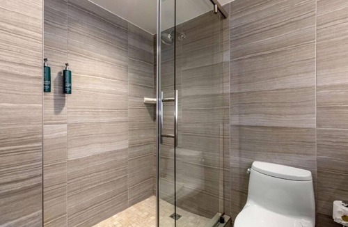 West End Hotel | Three 1-Bedroom King Suites | Free Breakfast, Kitchenettes & Hot Tub Access