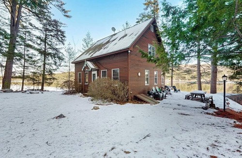 South Casco House | Tranquil Lakefront Retreat with large outdoor patio, beach and Stunning Views