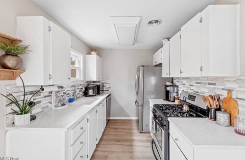 Akron House | Travel Professionals Towpath Cottage w HOTTUB Pet-Friendly Canal Fenced Yard!