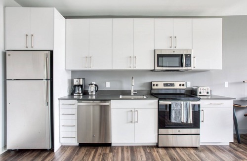St. Elizabeth's Apartment | Trendy Brighton 1BR w/W/D, Gym, near T, Shops + Dining, by Blueground