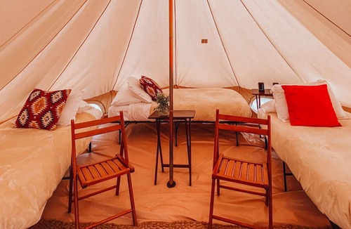 Tropic House | Triple Tent w/ Shared Bathroom - Beauty awaits you just past the red cliffs.