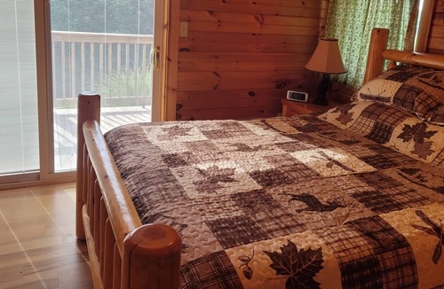 Bidwell Cabin | Twin Oaks is a rustic and pet friendly cabin located on 50 mostly wooded acres