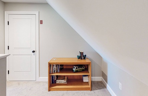 Arundel Condo | Two stroy condo with heated pool, gym, private patio, gas fireplace, W/D, AC