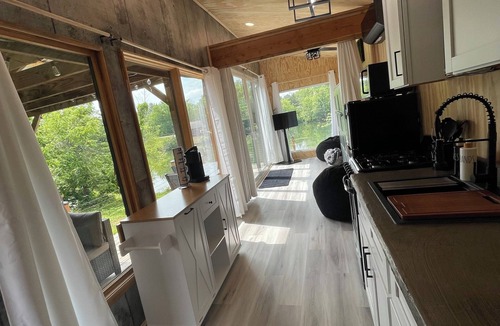 Odessa Cabin | Unplug and unwind in this charming loft cabin nestled on the water’s edge.