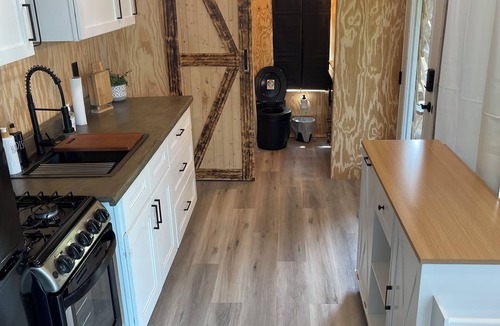 Odessa Cabin | Unplug and unwind in this charming loft cabin nestled on the water’s edge.