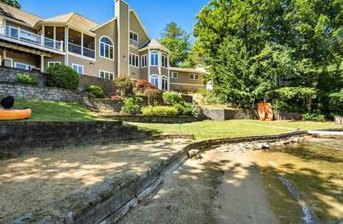 Lochmere House | Unwind in Waterfront Luxury: Custom Home in a Peaceful Cove