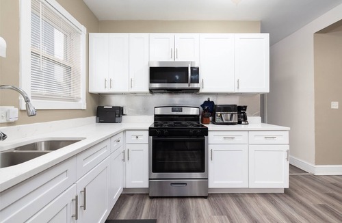 Hartford House | Urban 2-Story Remodeled Townhouse Retreat