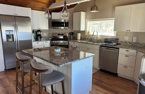 Washington House | Waterfront Family Getaway with Sunroom & Stunning Views