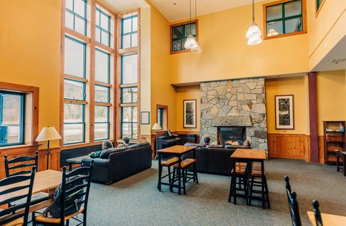 Carroll Hotel | White Mountains Basecamp, Gear Library, Breakfast, Onsite Trailhead, Shared Bath
