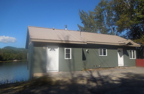 Hartford House | Winter, Spring, Summer, or Fall this Worthley Pond Cottage has it all.
