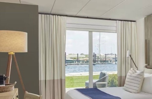 Goat Island Hotel | Your Perfect Getaway! w/Onsite Pool, Gym! Near Downtown Shopping District!