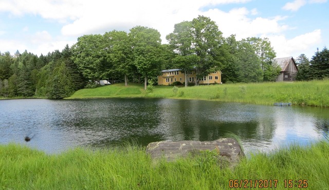 450 Acre renovated 1840's 4 bedroom, 3 1/2 bath farmhouse, with large pond.