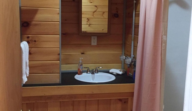 6 separate 4- season Beautiful Cabins located in downtown Milo ME