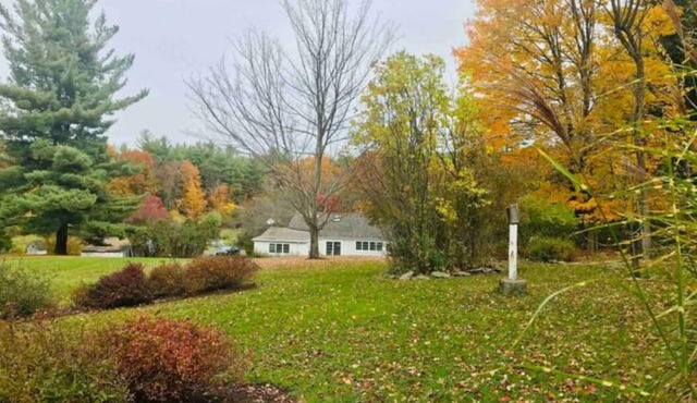 9 acres of elegant gardens, rolling lawns, wooded paths and a private pool