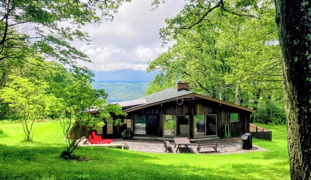 A spectacular Shawangunk vista in a beautifully renovated chalet on a lush lawn.