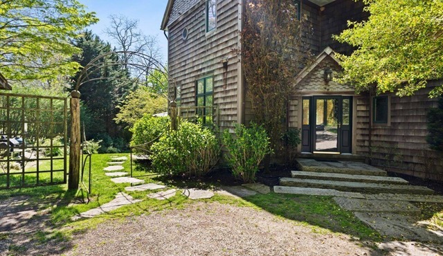 An elegant and spacious 5 bedroom Woods Hole retreat with coastal charm.