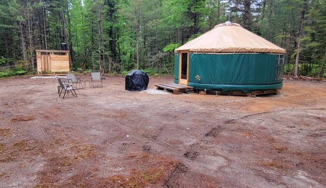 Ava Jade yurt nestled in the woods of Brownfield, Maine