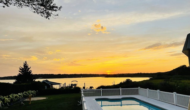 Bay front Hamptons home with direct sunsets and private dock with pontoon boat