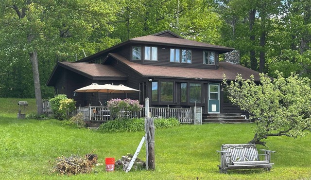 Beautiful 6 Bedroom Lakefront Home w/Own Dock and beautiful Lake Views Please note that this home does not have air conditioning. Box fans are provided and because of our proximity to the lake, it is cooler in the evenings.