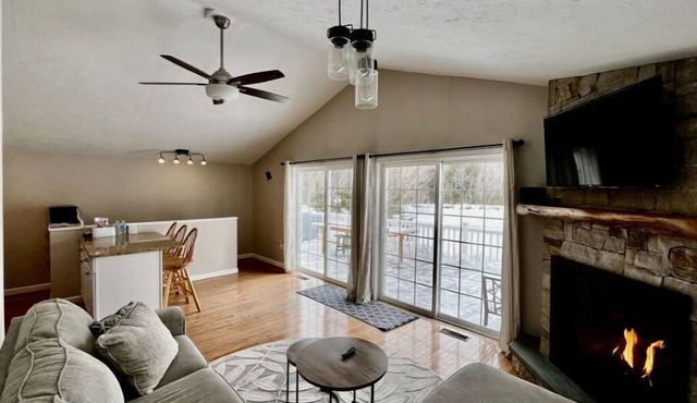 Beautiful lakefront! Private, sandy beach. Fire pit. Parking. Two living areas.
