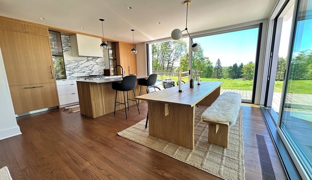 Beautiful renovated home with wooded trail along stream & gorgeous views of lake