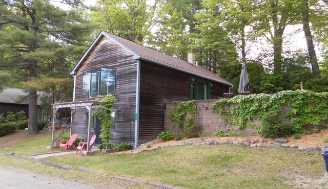 Beautifully appointed lake-view cottage with dock access