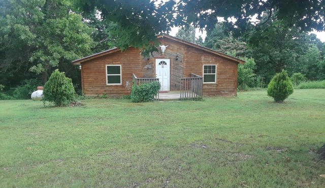 Cedar cabin located on a buffalo farm