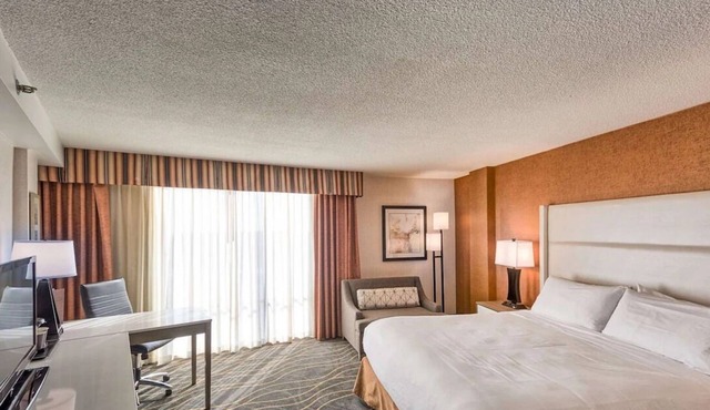 Central Location: Free Airport Shuttle and Free Parking | Indoor Swimming Pool