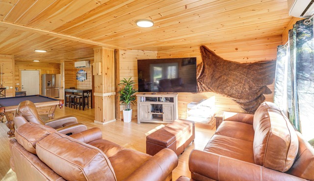 Cozy 1-bedroom house in quaint Patten with AC comfort. Snowmobile and 4x4 nearby
