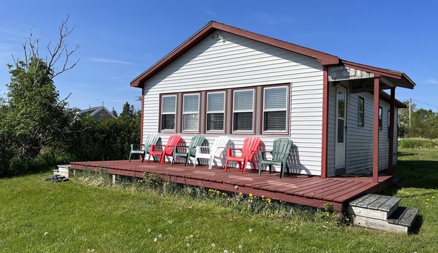 Cozy cottage, steps from the beach.