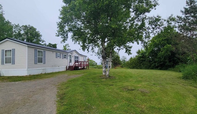 Cozy two bedroom home with ocean view. Quiet and secluded location.
